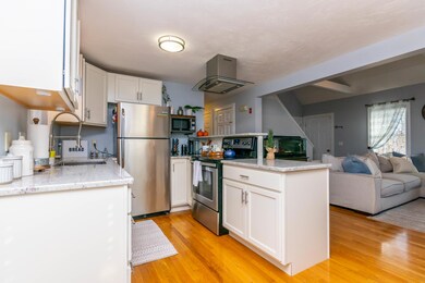 Kitchen opens to living room