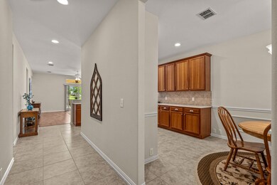 Front hall with the eat-in kitchen to the right