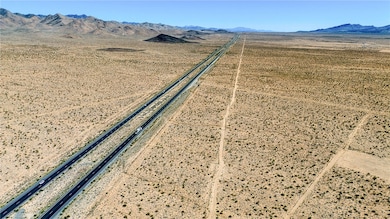 Aerial view of sparsely populated area with a dese