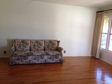 LIVING ROOM. ORIGINAL HARDWOOD FLOORS. BIG FRONT W