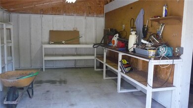 Work shop space on the left side of the garage.   