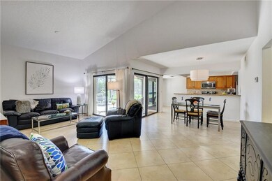 Wide-open living areas with soaring 14' ceiling.