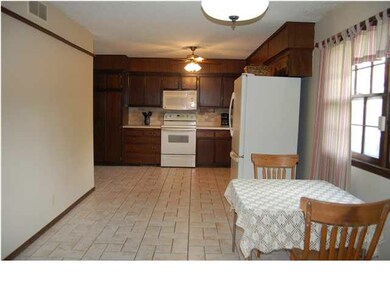 KITCHEN AND DINING AREA.