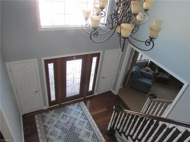 Newer Wood Floor & Newer Front Door in Foyer