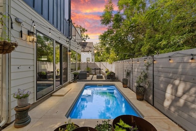 View of swimming pool featuring a fenced backyard