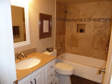 Hall Bathroom with Travertine Surround