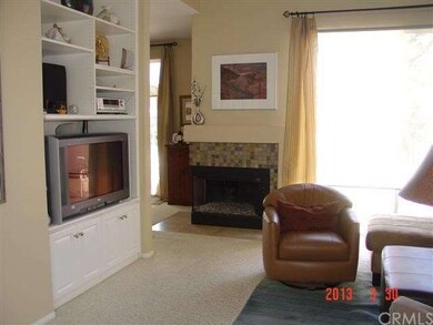 Fireplace Shared Between Living and Dining Area