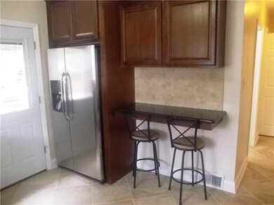 Kitchen. The kitchen features bright, shiny, new, 