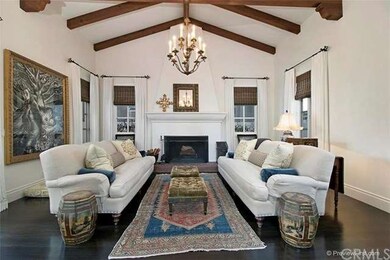 Cathedral beamed living room with wood burning fir