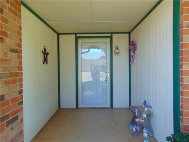A great welcoming covered entrance to this updated