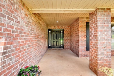 Property entrance with brick siding