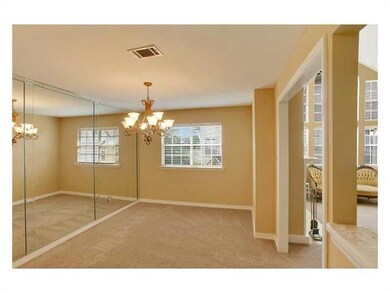 Photo. Dining area is open to kitchen and the den.