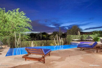 infinity edge pool/spa w/city light view