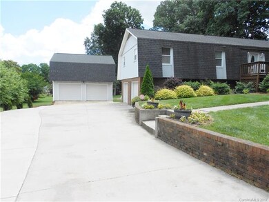 Two car garage attached to house plus a two car garage detached with storage in the attic.  The driveway is huge and there isn't a HOA so it's a great place to live if you need to park a boat or motor home.