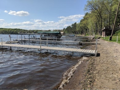 View of beach area at lake's edge. An annual $75 p