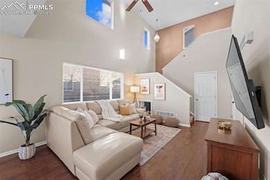 Open living room with LVP and soaring ceilings!