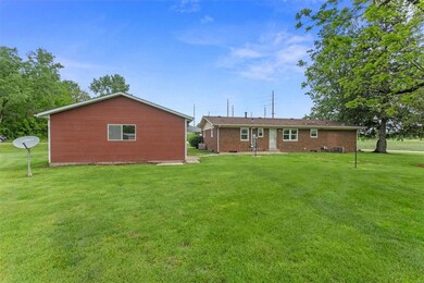 Exceptionally well maintained 1 story brick ranch on .73 acres with oversized detached 2 car garage.