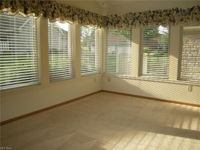 Four seasons sunroom with vaulted ceilings.