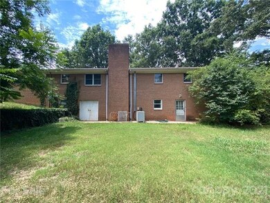 Double doors on the left go into the main area of the basement. The door on the right could be a private entrance into an office if desired.