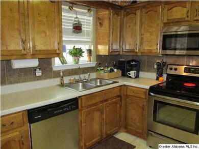 Kitchen with lots of cabinets and new appliances