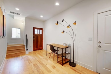 Entryway featuring recessed lighting, stairway, l