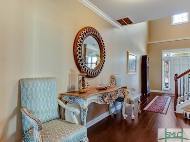 Elegant and Open Foyer with setback gorgeous stair