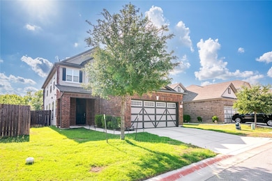 Obstructed view of property featuring driveway, b