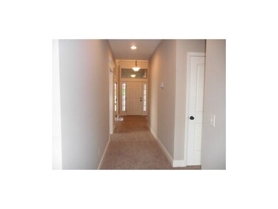 Entry and wide hallway to great room.