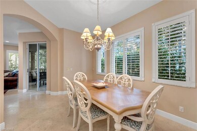 Dining room with an inviting chandelier and a heal