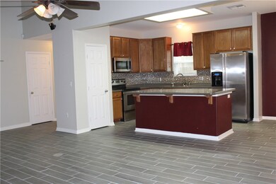 New wood ceramic tile floors JUST installed throughout all living areas. Beautiful update to this home!