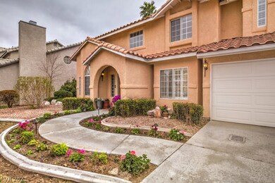 Beautifully landscaped entrance to the home, with