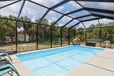 View of swimming pool featuring a lanai and a pati