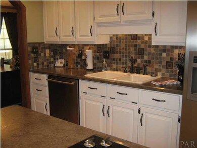Notice the backsplash in kitchen