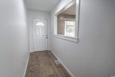 Entryway featuring light hardwood / wood-style flo
