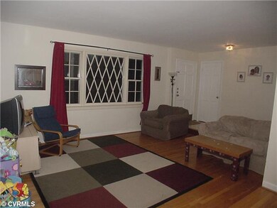 Other - Living room with oak floor and picture win