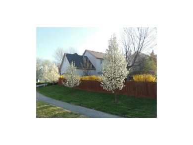 Side Entry Garage and Beautiful Flowering Trees an