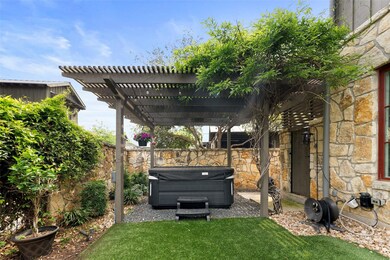 View of yard featuring a fenced backyard, a pergo