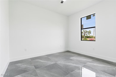 1107 W 18th St, Lehigh Acres, FL 33972 - photo 7