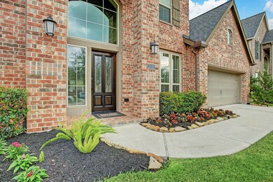 Fresh mulch allows for easy maintenance for this incredibly well maintained home.