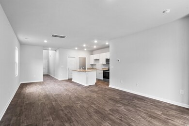 Unfurnished living room with dark hardwood / wood-
