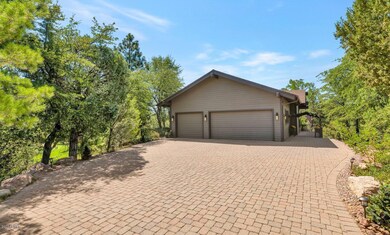 Large Paverd Drive with 3 Car Garage