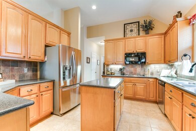 Stainless appliances and gorgeous backsplash!