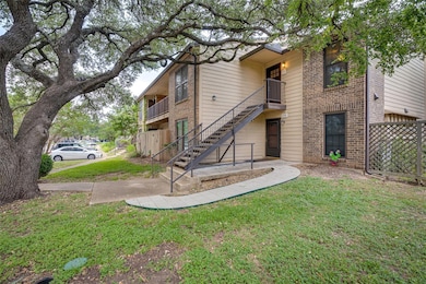 View of property with stairs