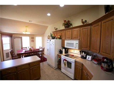 Kitchen. Great kitchen with large breakfast bar, stove, microwave and dishwasher.