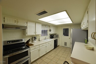Kitchen with Newer SS Appliances