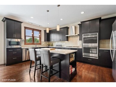 Custom cabinets, hardwood floors in kitchen
