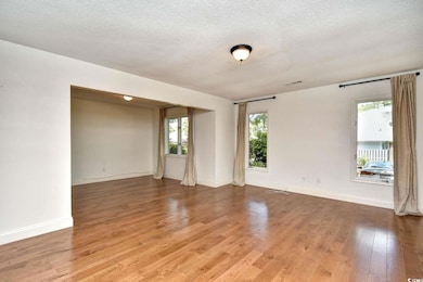 Unfurnished room with light wood finished floors, 