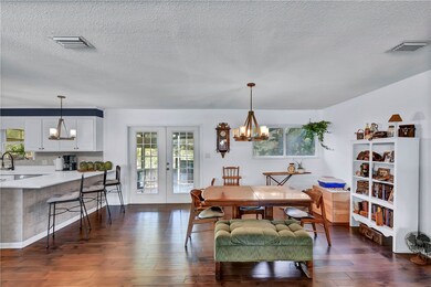 Dining/Kitchen, french door to screened porch