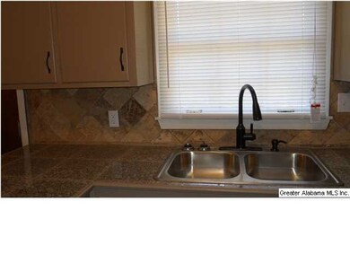 New bronze faucet and stainless steel sink. New ce