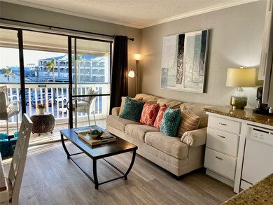The view of the living room from the kitchen.